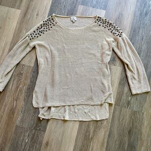 Slouchy knit sweater with stud shoulder detail